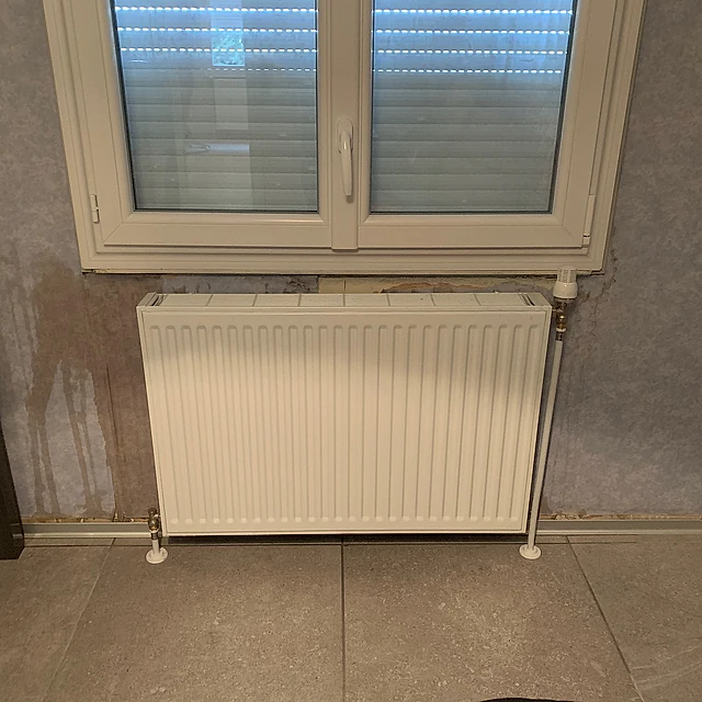 Installation de radiateurs alimentés par une PAC air/eau